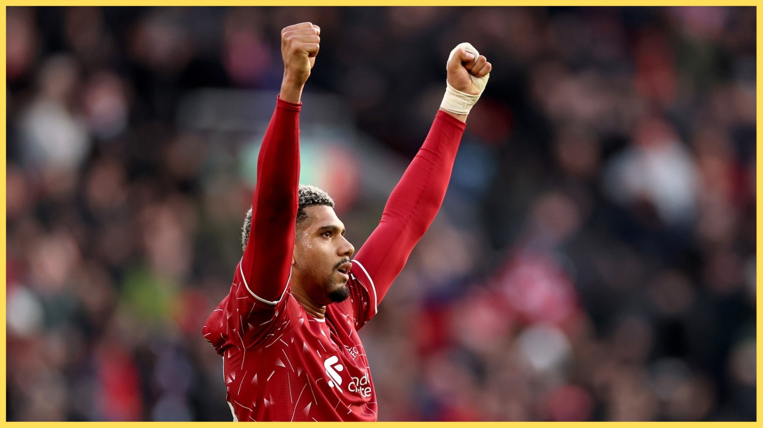 Ronald Araujo raises his arms in triumph after Liverpool's win over Brighton