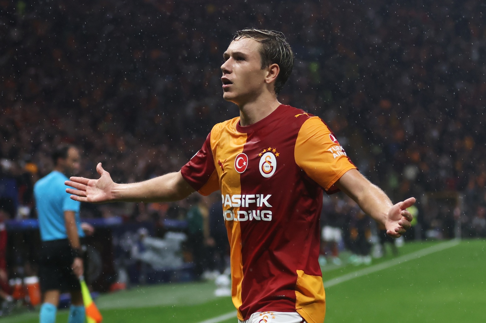 Aleksei Batrakov celebrates scoring for Galatasaray in the Champions League