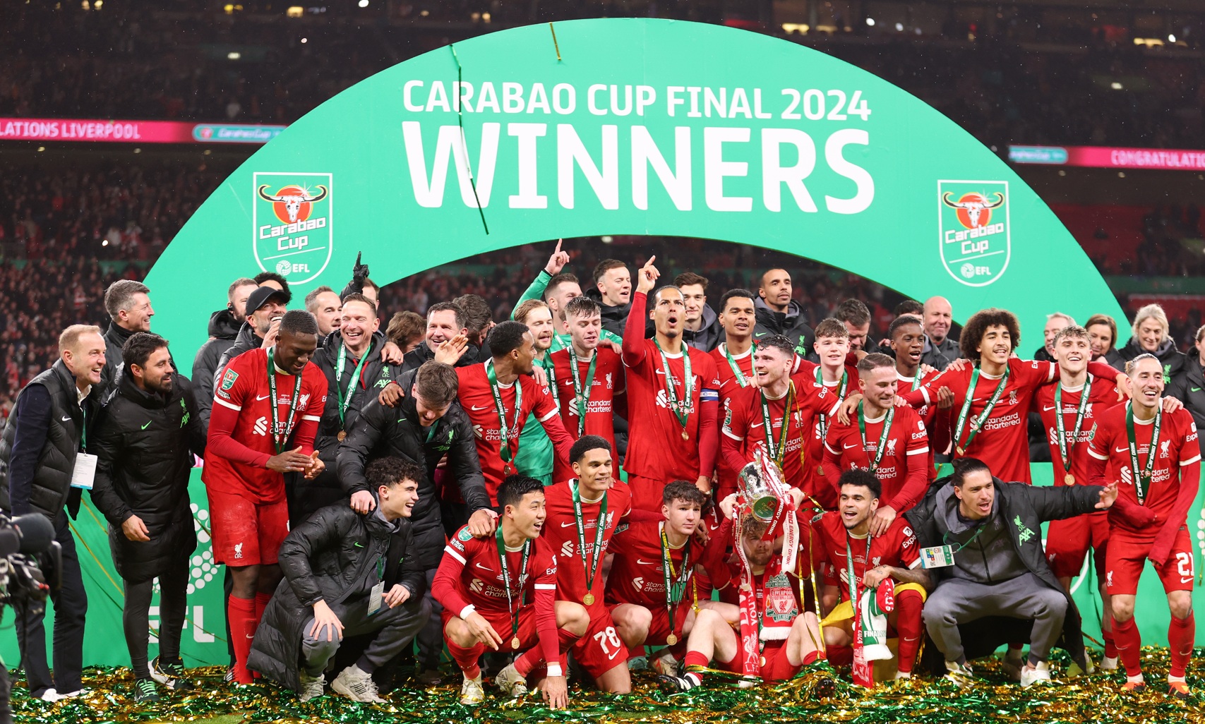 Liverpool players and staff celebrate winning the Carabao Cup in 2024