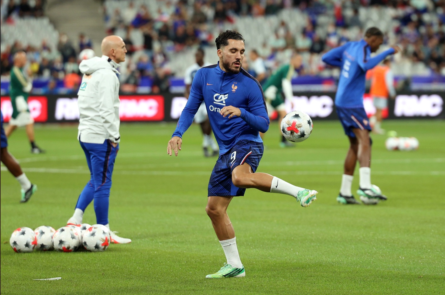 Rayan Cherki pictured during the warm-up for France