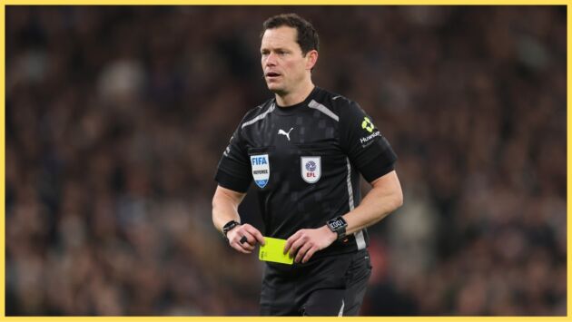 Darren England takes out a yellow card