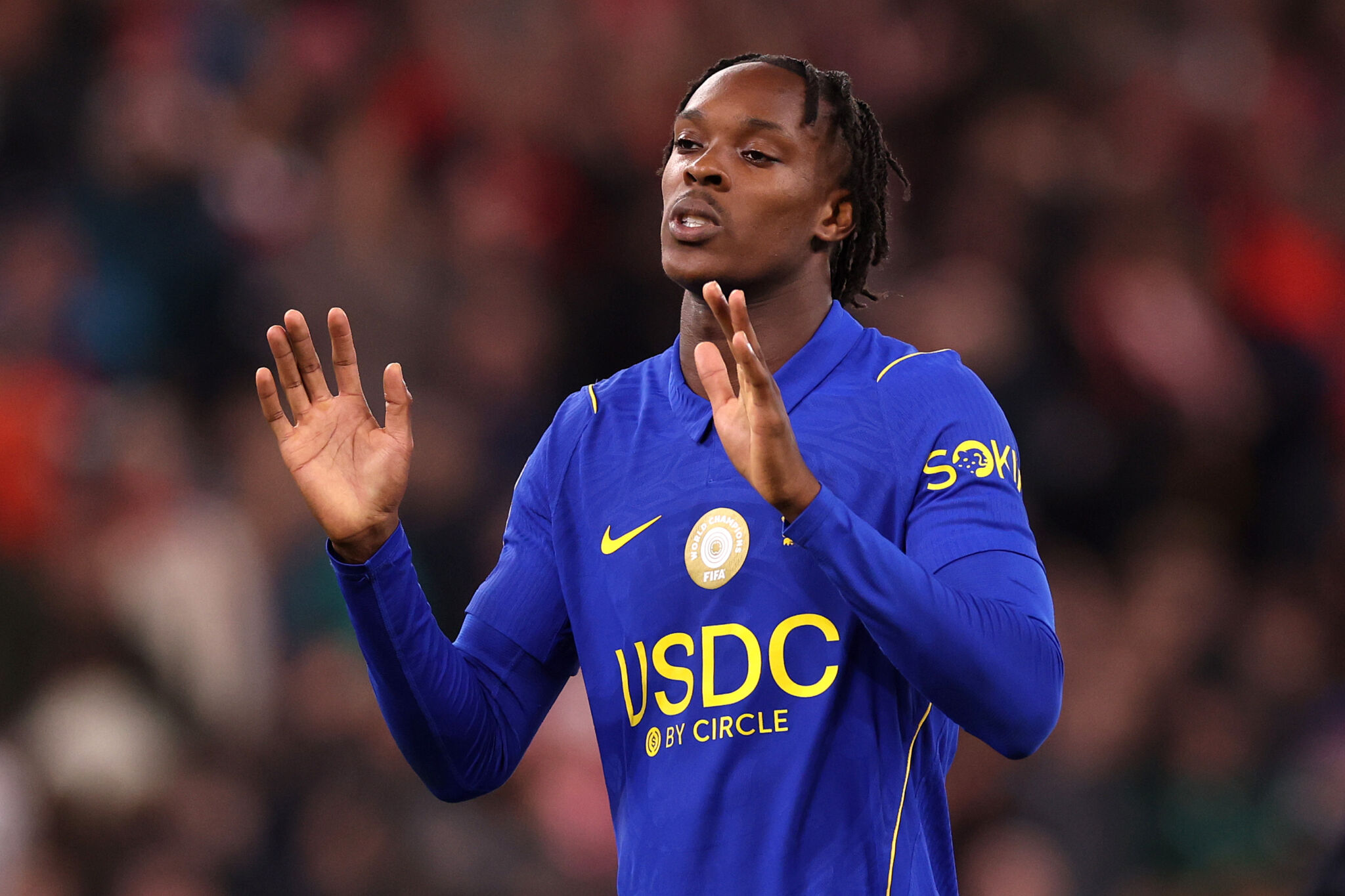 Emmanuel Emegha reacts during Chelsea's match against Liverpool