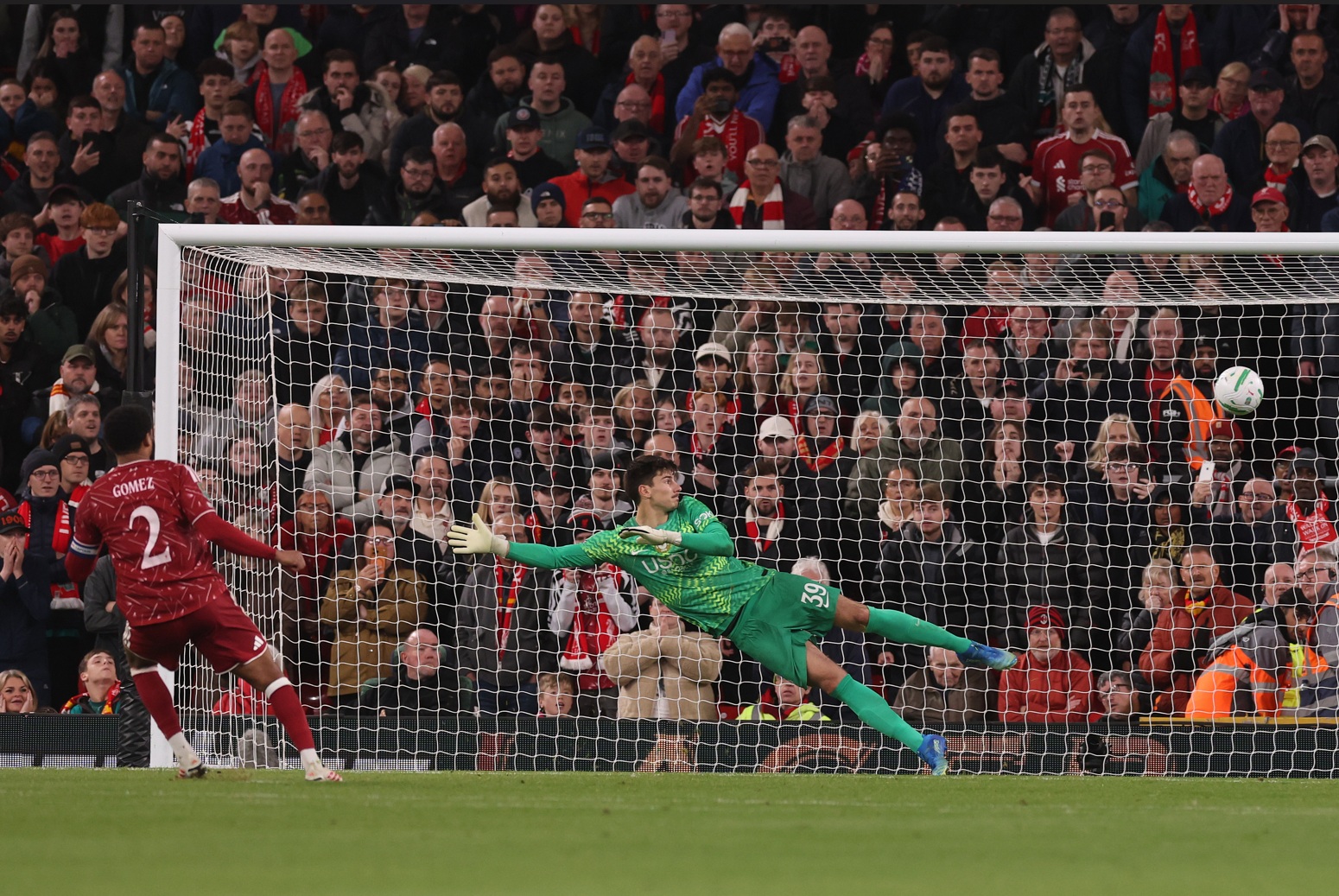 Joe Gomez converts his penalty in Liverpool's shootout triumph over Chelsea