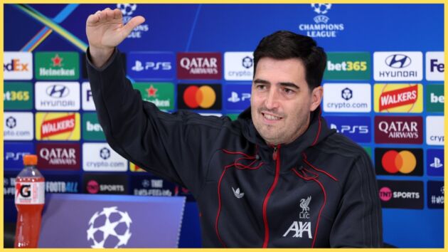 Andoni Iraola makes a hand gesture during a press conference