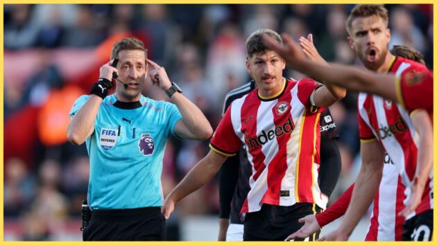 John Brooks points to his head as Brentford players protest