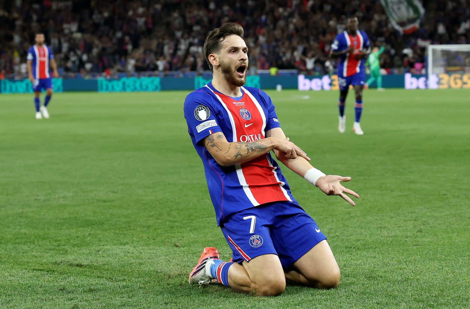 Khvicha Kvaratskhelia celebrates scoring for PSG