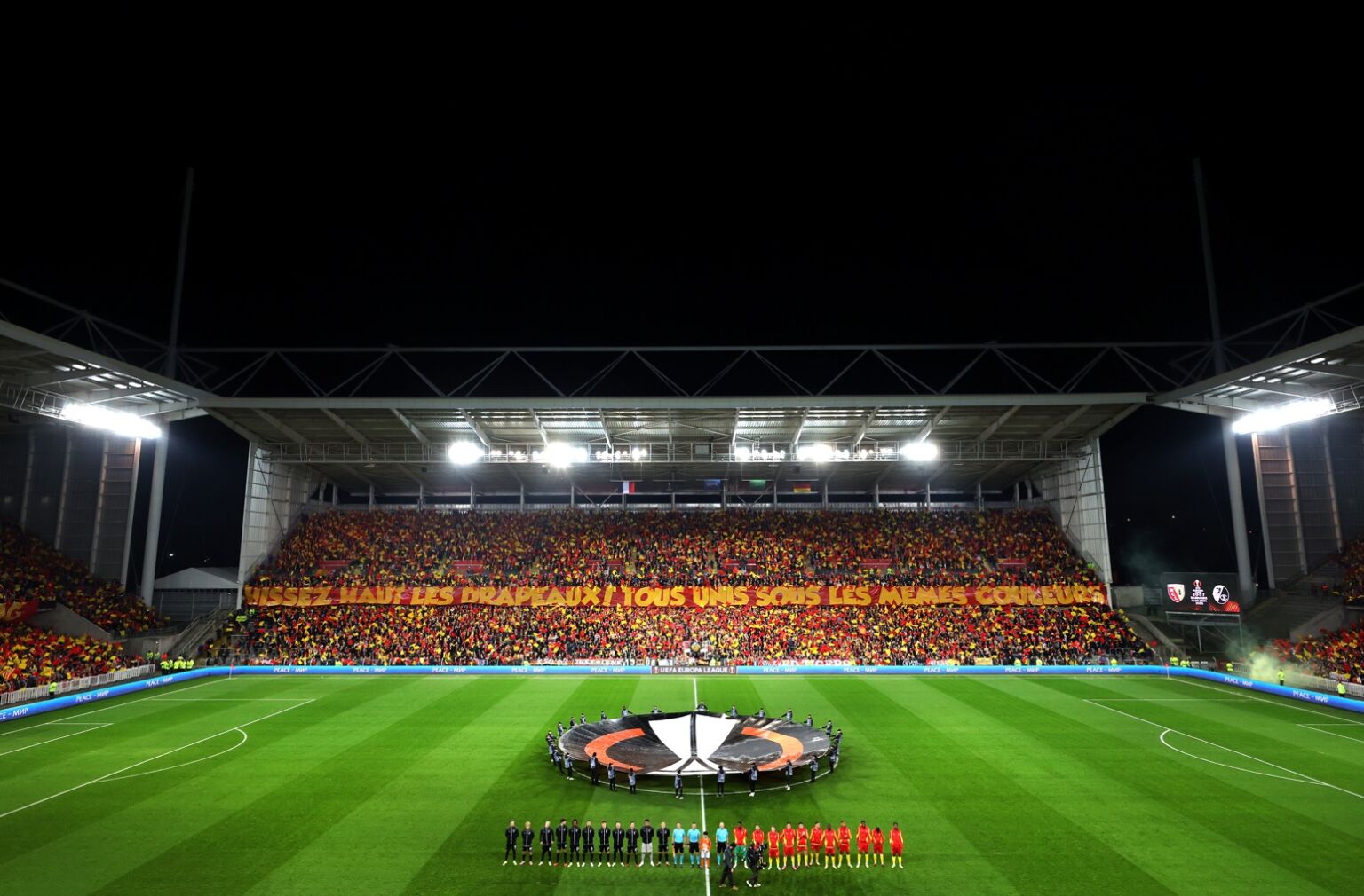 Lens supporters display a tifo before a Europa League fixture