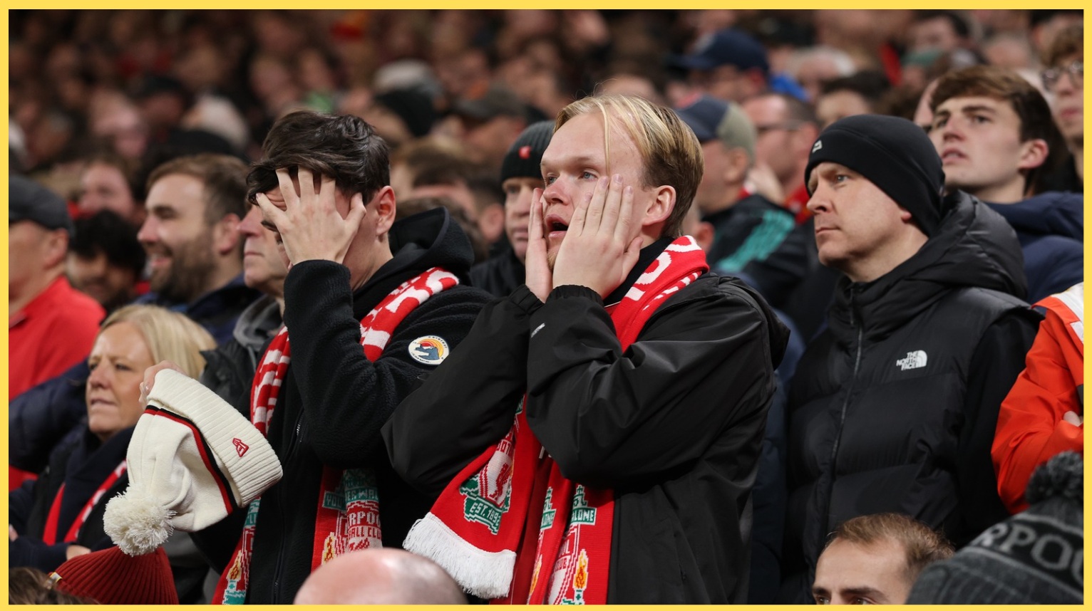 Liverpool fans look on in horror at Anfield