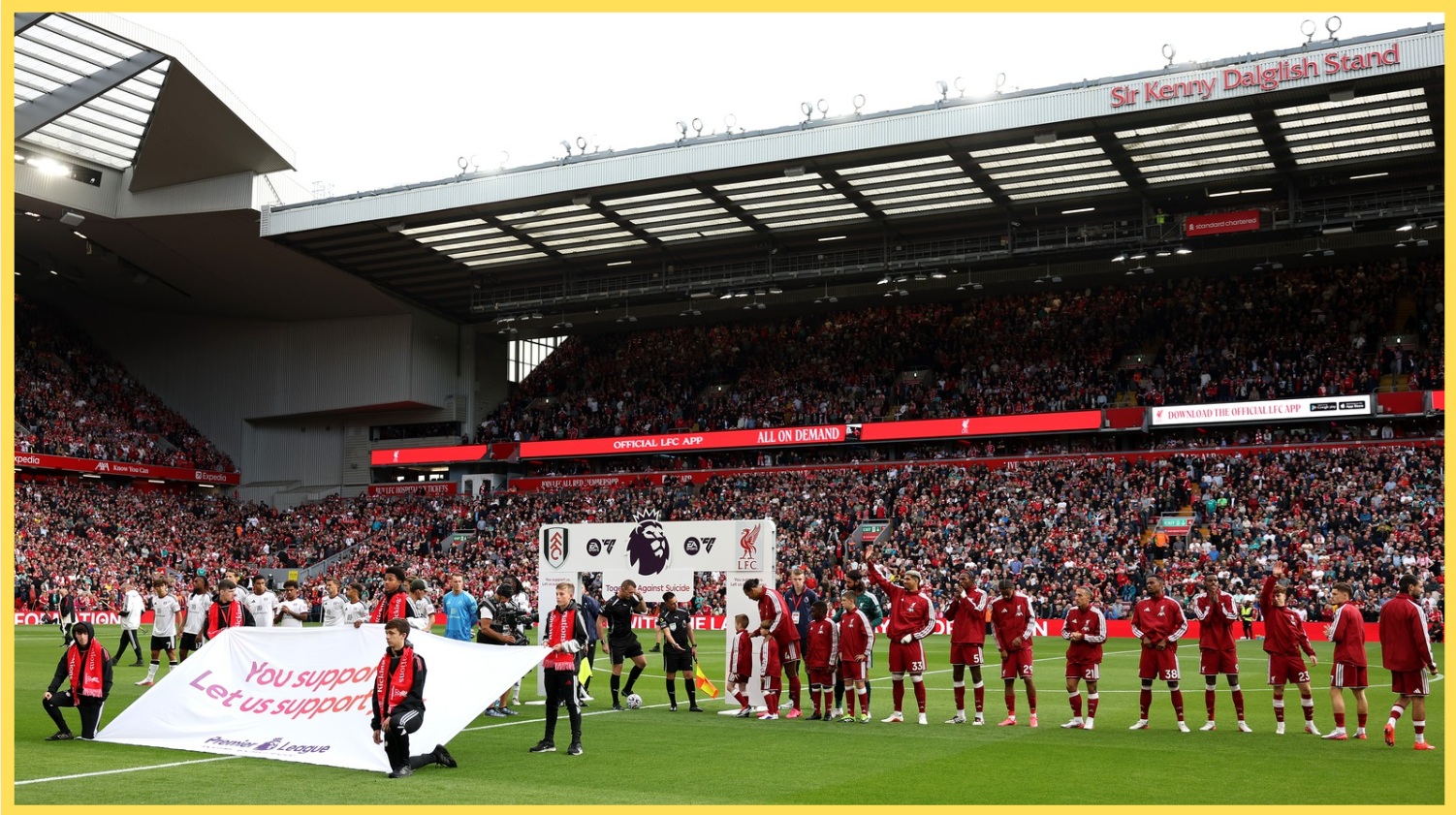 Liverpool players line up prior to their match against Fulham