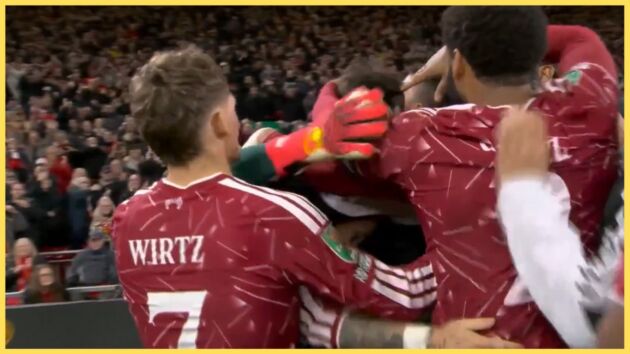 Giorgi Mamardashvili is mobbed by his Liverpool teammates after the Carabao Cup win over Chelsea