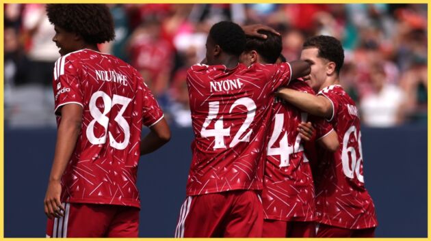 Liverpool players celebrate with Luke Chambers after scoring in a pre-season game