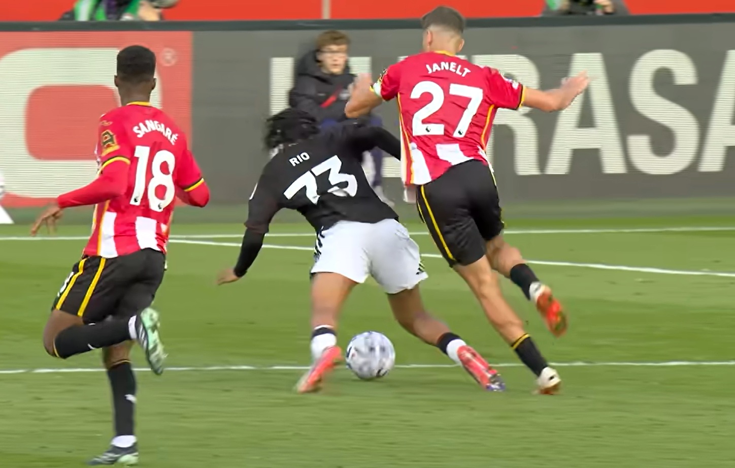 Vitaly Janelt brings down Rio Ngumoha to earn a second yellow card