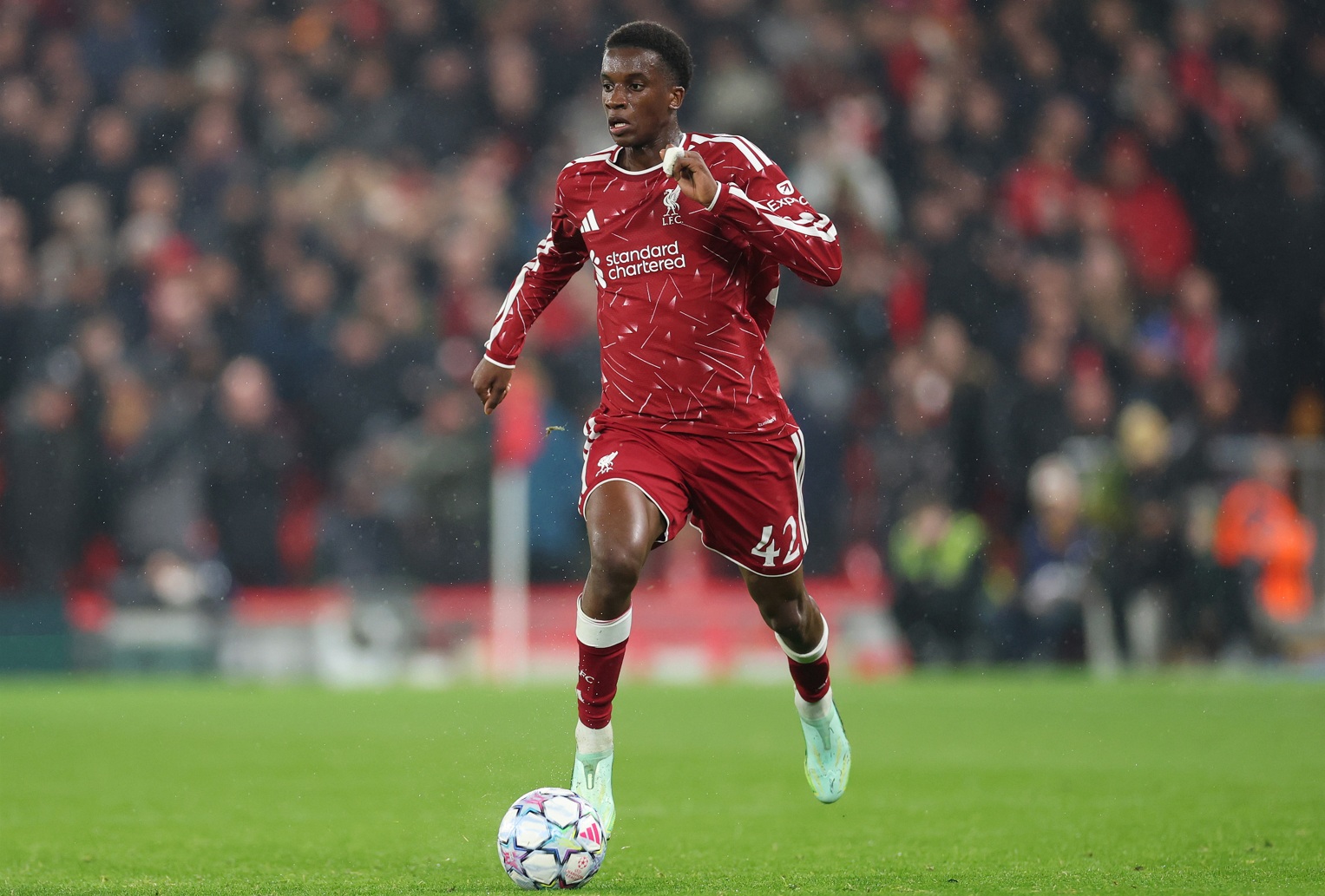 Trey Nyoni runs with the ball during a game for Liverpool