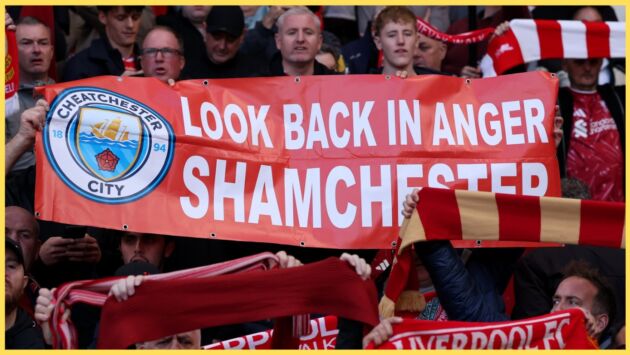 Liverpool fans hold up a banner decrying 'Shamchester' City