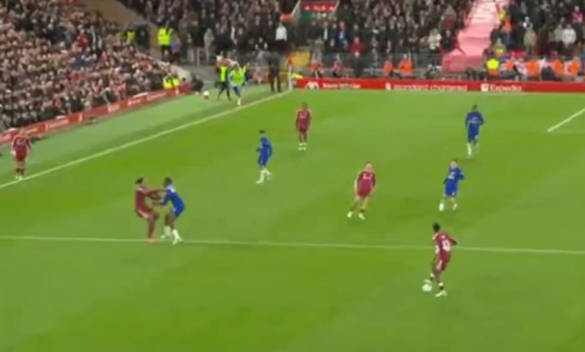 Emmanuel Emegha pushes Virgil van Dijk to the ground