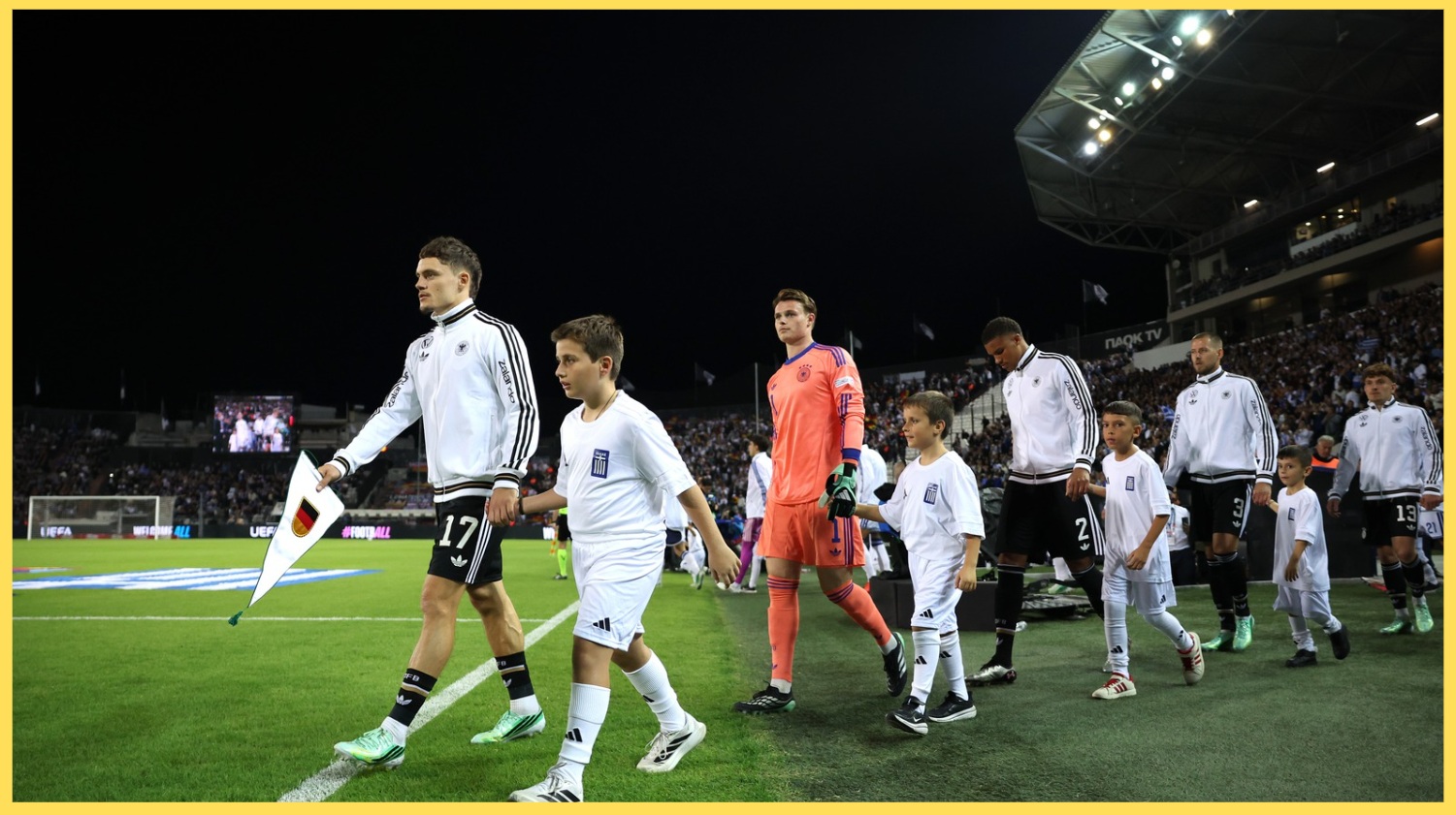 Florian Wirtz leads the Germany team onto the pitch as captain