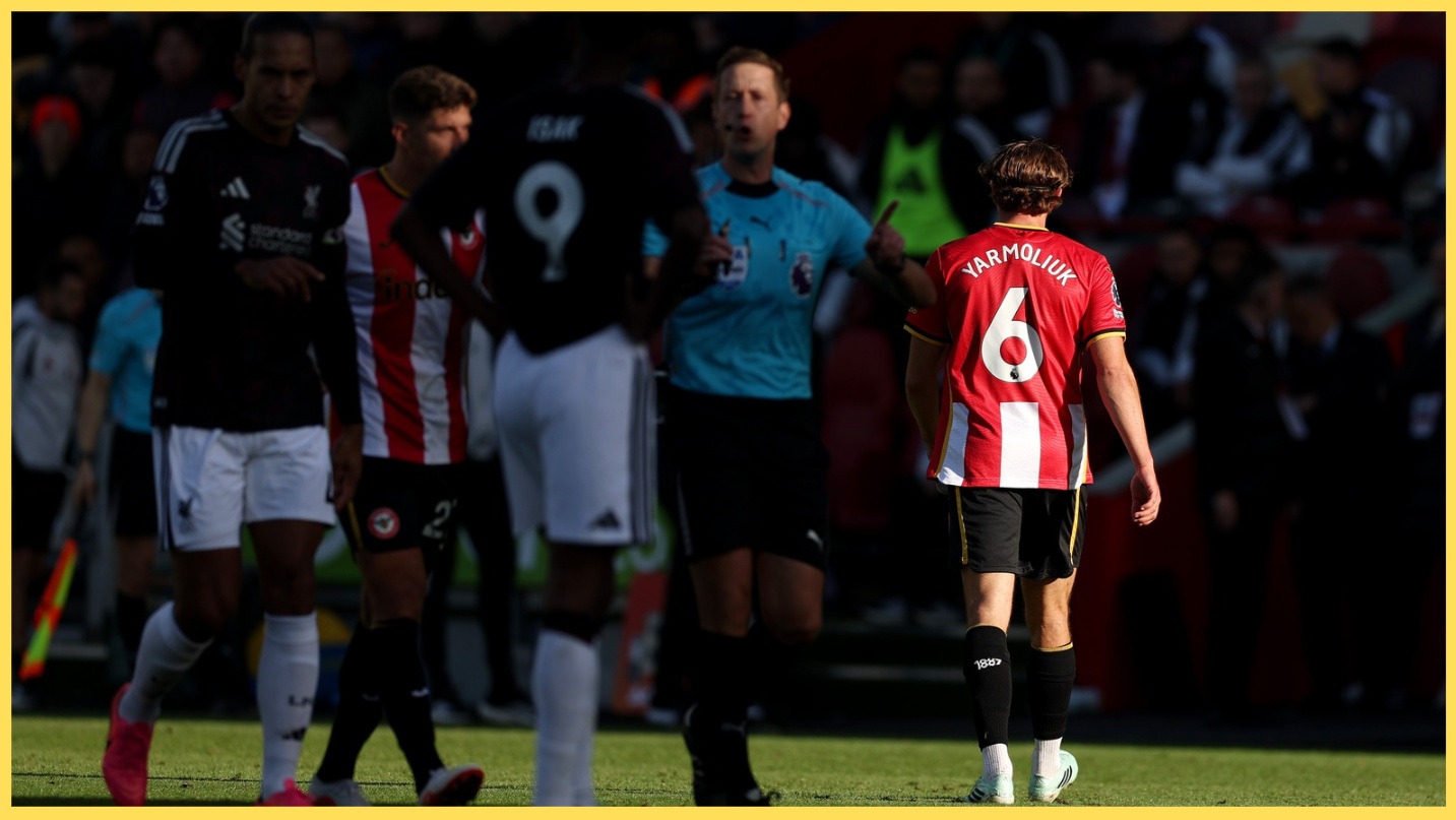 Yehor Yarmolyuk leaves the pitch after being sent off against Liverpool