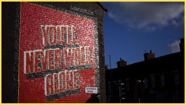 A mural depicting the words 'You'll Never Walk Alone' near Anfield