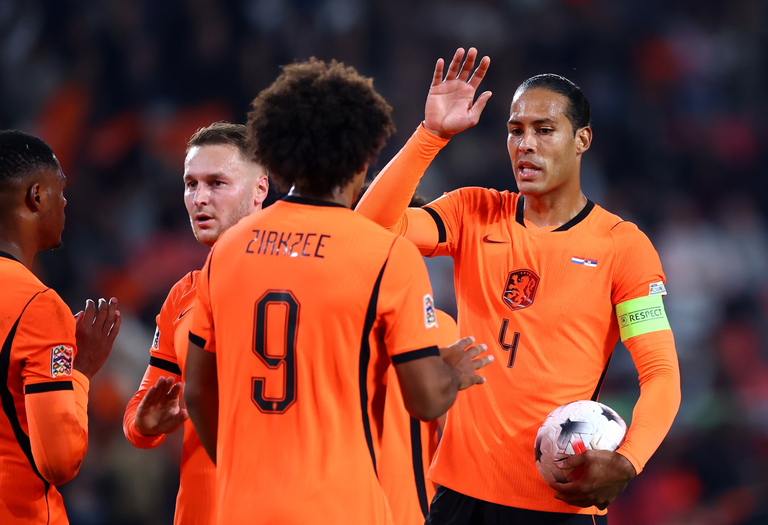 Virgil van Dijk high-fives Joshua Zirkzee after Netherlands' win over Serbia
